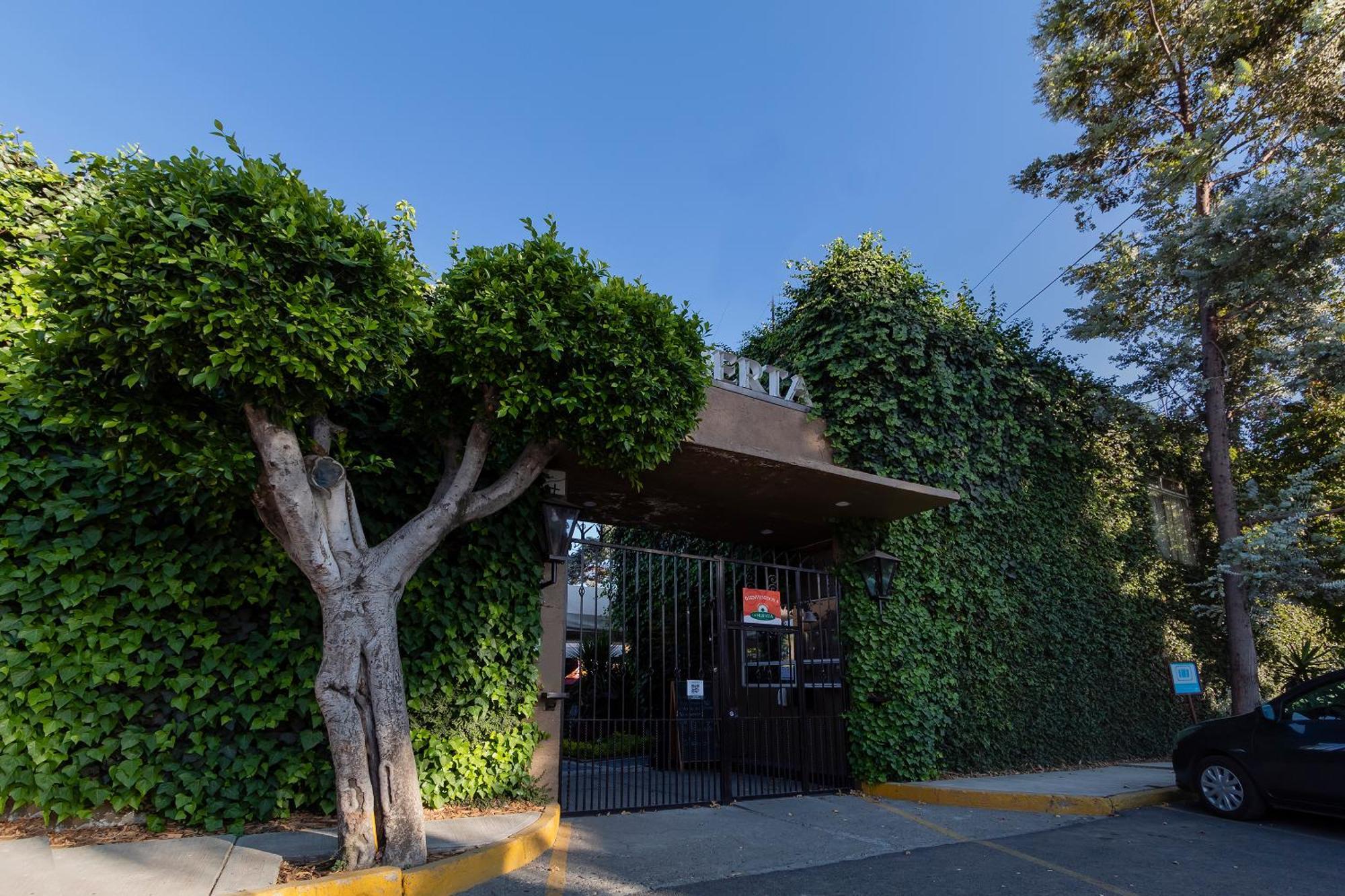 Capital O La Huerta Golf & Hotel Cholula Exterior photo