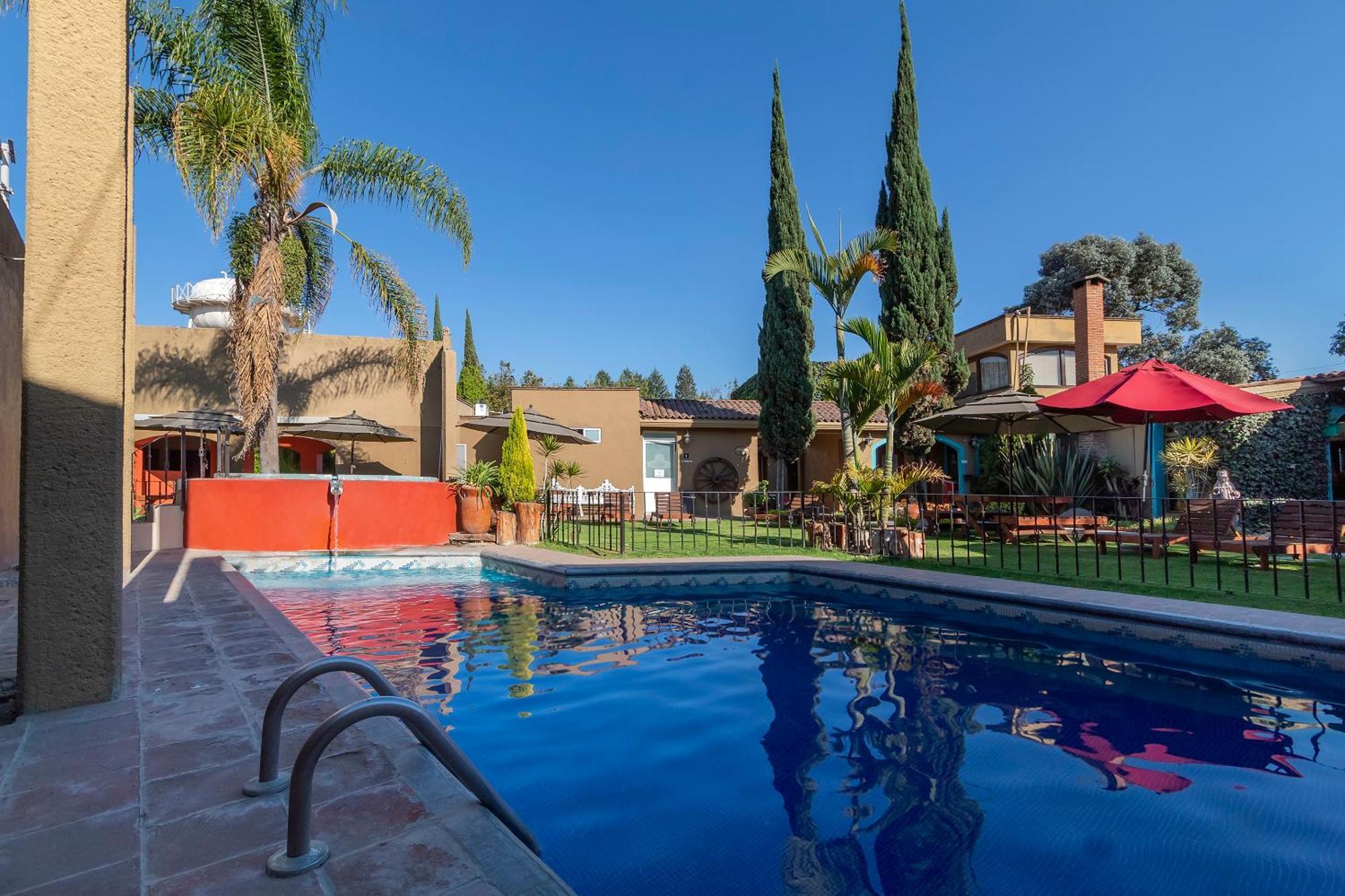 Capital O La Huerta Golf & Hotel Cholula Exterior photo