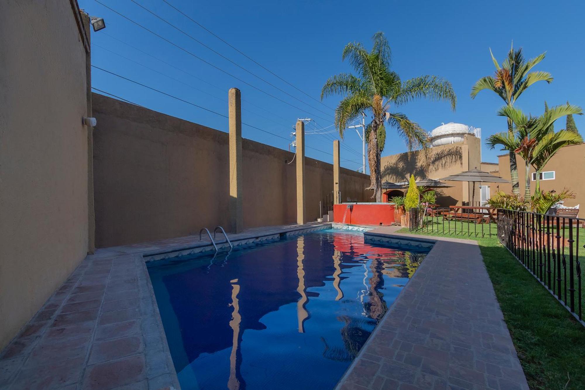 Capital O La Huerta Golf & Hotel Cholula Exterior photo